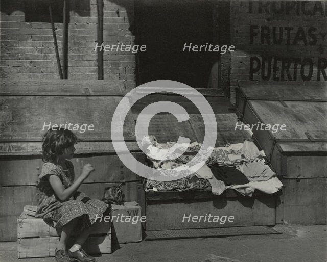 Park Avenue - Young girl selling clothes on the street, East Harlem, New York City, 1947 - 1951. Creator: Romulo Lachatanere.