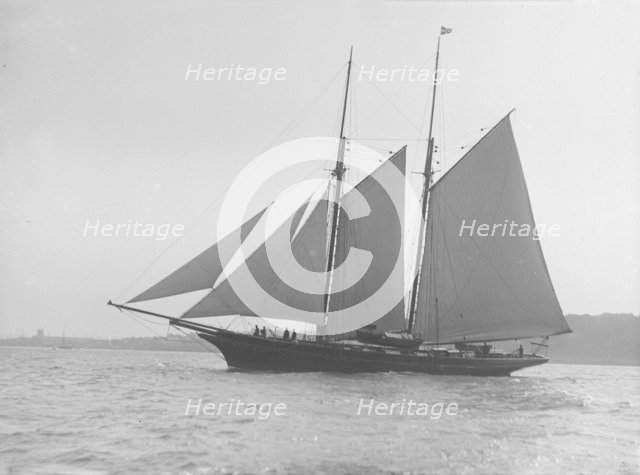 Schooner sailing, 1912. Creator: Kirk & Sons of Cowes.