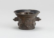 Mortar with Sun, Moon, and Dolphin-shaped Handles, early 16th century. Creator: Unknown.