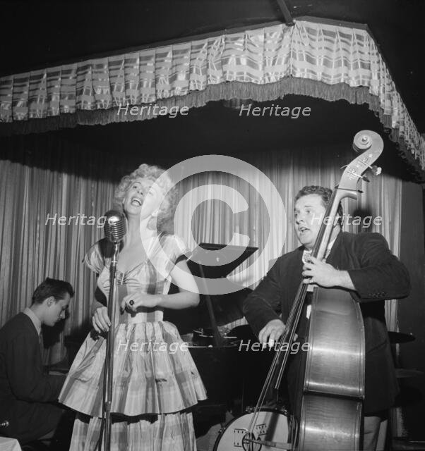 Portrait of Chubby Jackson and Dottie Reid, Onyx, New York, N.Y., ca. July 1947. Creator: William Paul Gottlieb.