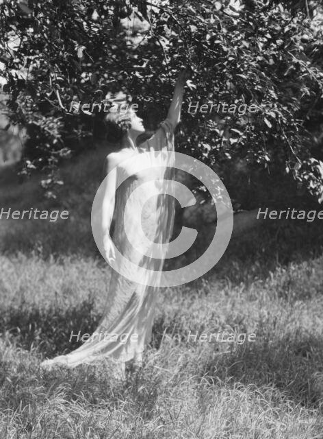 Olson, Margaret, Miss, standing outdoors, 1924 July. Creator: Arnold Genthe.