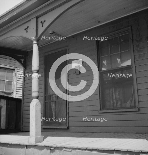 Furnish room in the Negro quarter from which cotton hoers are recruited, Memphis, Tennessee, 1937. Creator: Dorothea Lange.