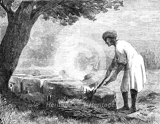 Sketches in Madagascar: native distilling spirit from sugar-cane, 1881. Creator: Unknown.