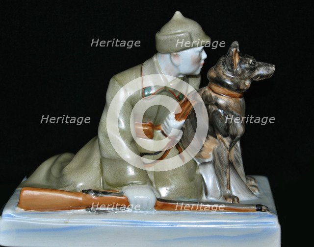 Soviet border guard with his dog, End 1930s.