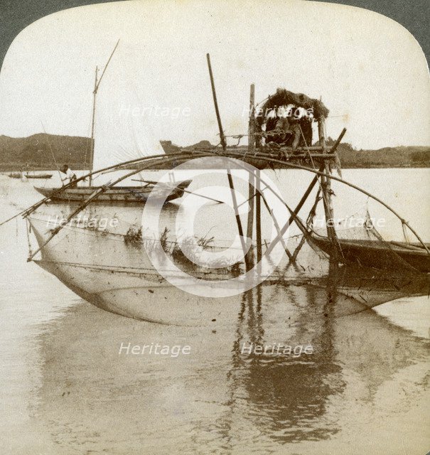 'Toiler of the sea', with his curious fishing net, bay of Matsushima, Japan, 1904. Artist: Underwood & Underwood
