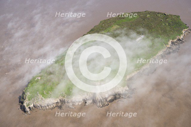 Low cloud over the island of Steep Holm, North Somerset, 2018. Creator: Historic England Staff Photographer.