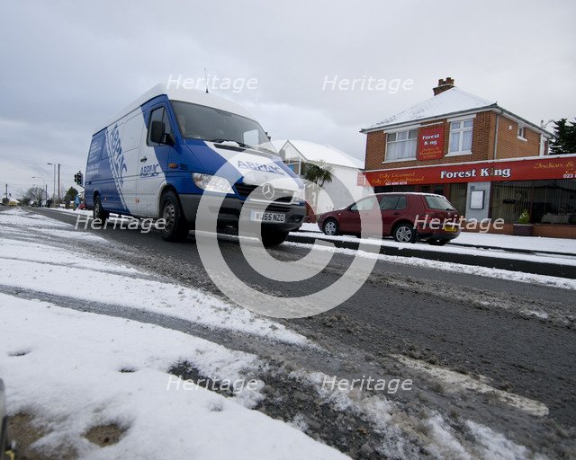 Van driving in slush, Blackfield 2009 Artist: Unknown.