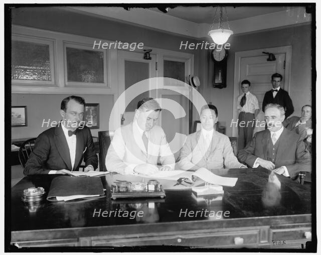 U.S. Shipping Board signing contract w/China, between 1910 and 1920. Creator: Harris & Ewing.