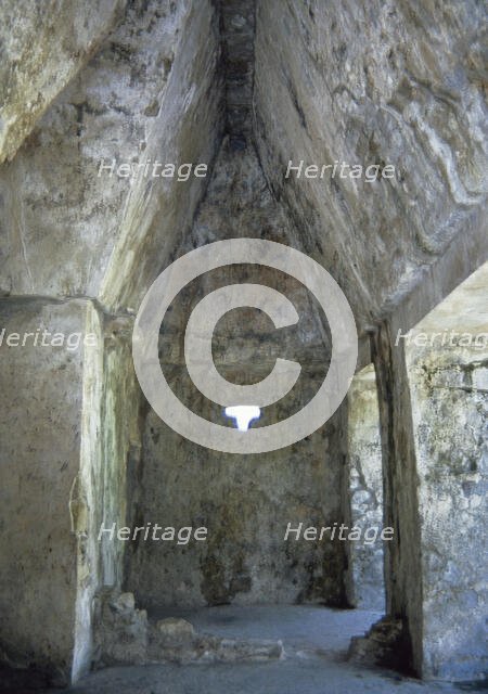 The Corbel arch seen in a hallway at the Palace, Palanque, Chiapas, Mexico, 1998.  Creator: Unknown.