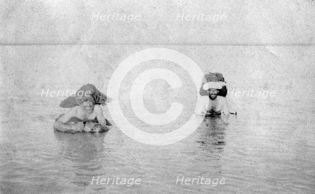 Crossing the Tigris river on inflated goat skins, 1918. Artist: Unknown