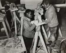 Boys sculpting a horse, Harlem Community Art Center, 1937. Creator: Solomon Horn.