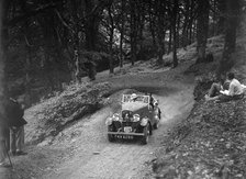 Triumph open tourer taking part in the B&HMC Brighton-Beer Trial, Fingle Bridge Hill, Devon, 1934. Artist: Bill Brunell.