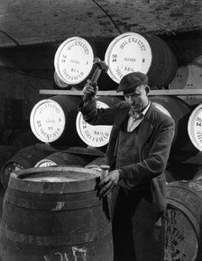 Coopering, making whiskey barrels at Wiley & Co, Sheffield, South Yorkshire, 1961.  Artist: Michael Walters