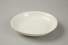 White dish with anhua design of two phoenix and cloud scroll design, Song dynasty, c.1300. Artist: Unknown.