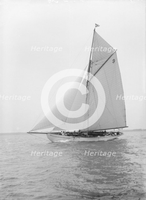 The cutter 'Westwind' sailing close-hauled, 1912. Creator: Kirk & Sons of Cowes.