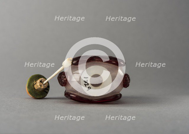 Clear glass snuff bottle with red overlay, China, Qing dynasty, 1644-1911. Creator: Unknown.