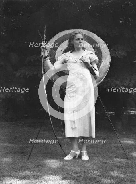Chase, Diana, Miss, doing archery, 1933 June 22. Creator: Arnold Genthe.