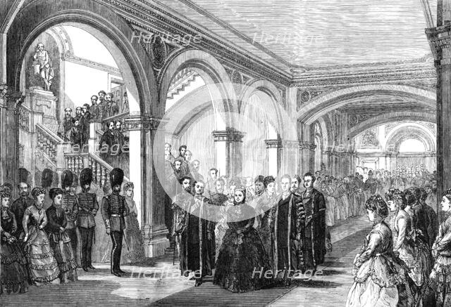The Queen passing through the lobby of the new building of London University, 1870. Creator: Unknown.