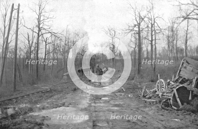 ''Le Champ de Bataille; La route "marmitee"', 1916 (1924) Creator: Unknown.