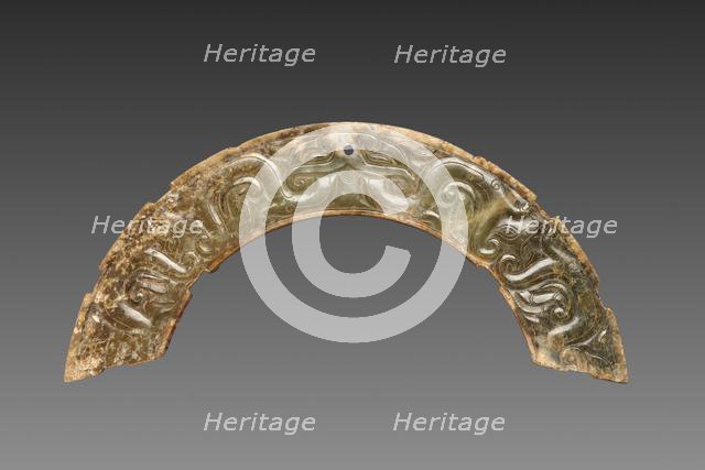 Arc-shaped Pendant with Animal Mask and Interlaced Animal Bands (Huang), 300-100 BC. Creator: Unknown.