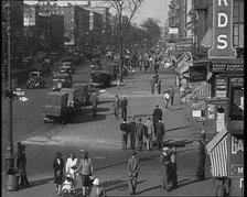 American Civilians Walking on the Pavement on the Streets , 1930s. Creator: British Pathe Ltd.