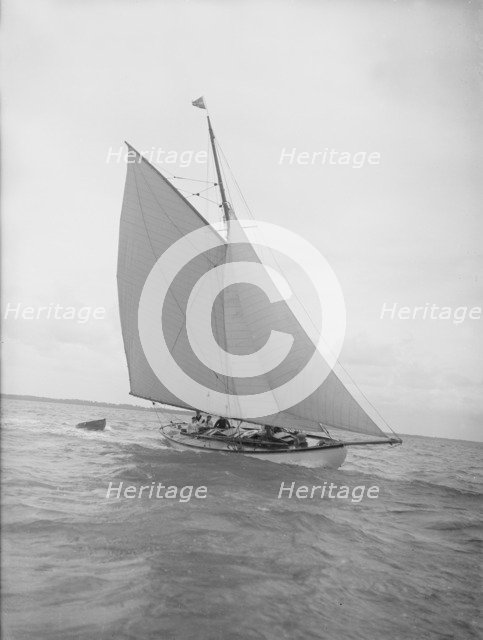 The cutter 'Nanette' sailing close-hauled, 1911. Creator: Kirk & Sons of Cowes.