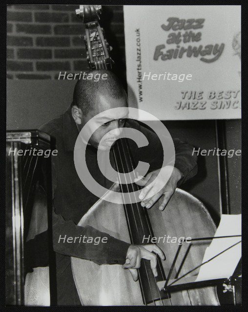 Double bassist Gary Crosby playing at The Fairway, Welwyn Garden City, Hertfordshire, 2004. Artist: Denis Williams