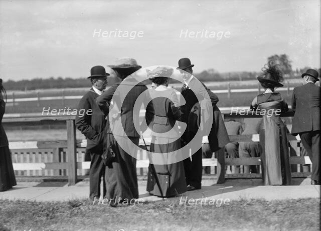 Benning Races - August Belmont; Mrs. Donald Cameron; Sec. Meyer., 1912. Creator: Harris & Ewing.