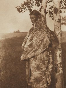 Cree Woman with Fur Robe, 1926. Creator: Edward Sheriff Curtis.