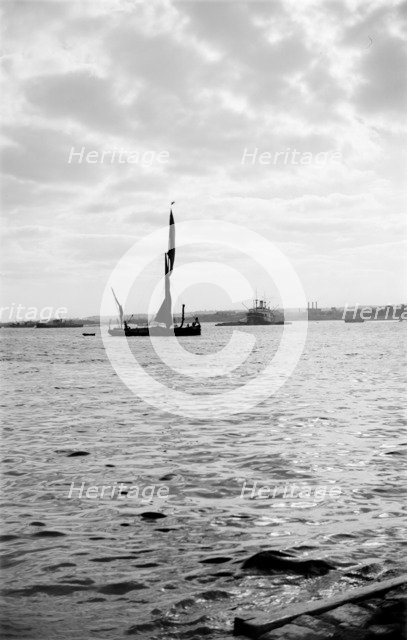 A Thames sailing barge in Gravesend Reach, Kent, c1945-c1965.  Artist: SW Rawlings
