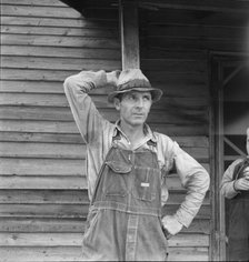 Tobacco sharecropper tells about his prospects, Person County, North Carolina, 1939. Creator: Dorothea Lange.
