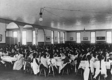 Students in dining hall, United States Indian School, Carlisle, Pa., 1901. Creator: Frances Benjamin Johnston.