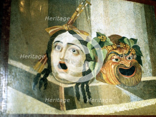 Theatrical masks of tragedy and comedy depicted in a Roman mosaic. Artist: Unknown