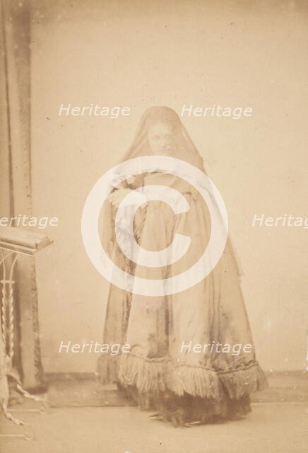 [La Comtesse in Hat with Veil and Cape with Fringe, Serie à la Ristori], 1860s. Creator: Pierre-Louis Pierson.