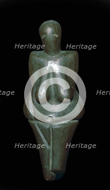 Paleolithic female figure of baked clay. Artist: Unknown