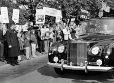 The Queen arrives at Chequers, ignoring protest banners about the Vietnam War, 1970. Artist: Unknown