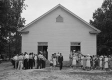 Congregation gathers in groups...Wheeley's Church, Person County, North Carolina, 1939. Creator: Dorothea Lange.