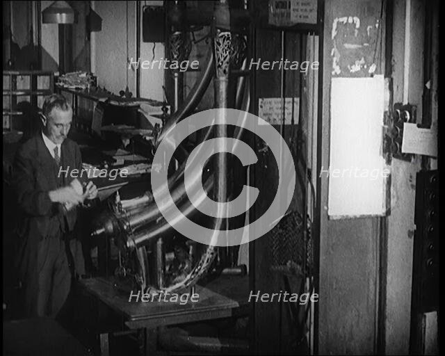 Worker in a Newspaper Office, 1921. Creator: British Pathe Ltd.
