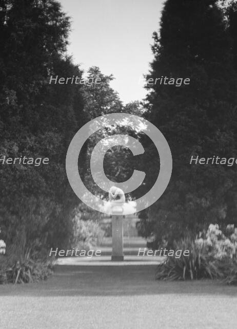 Statue by Paul Manship in the Griffin or Nissen Garden, 1931 June 14. Creator: Arnold Genthe.