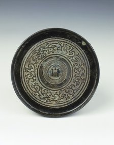 Bronze mirror with kui dragon pattern, Western Han dynasty, China, 2nd century BC. Artist: Unknown