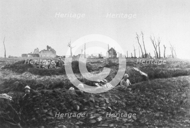 French infantry establishing fallback positions in front of a ruined farm, Picardy, France, 1918. Artist: Unknown