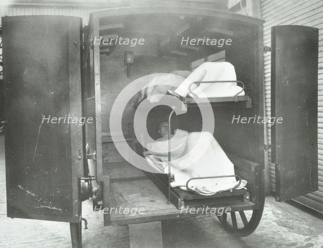 Interior of a horse drawn Metropolitan Asylums Board ambulance, London, 1939. Artist: Unknown.