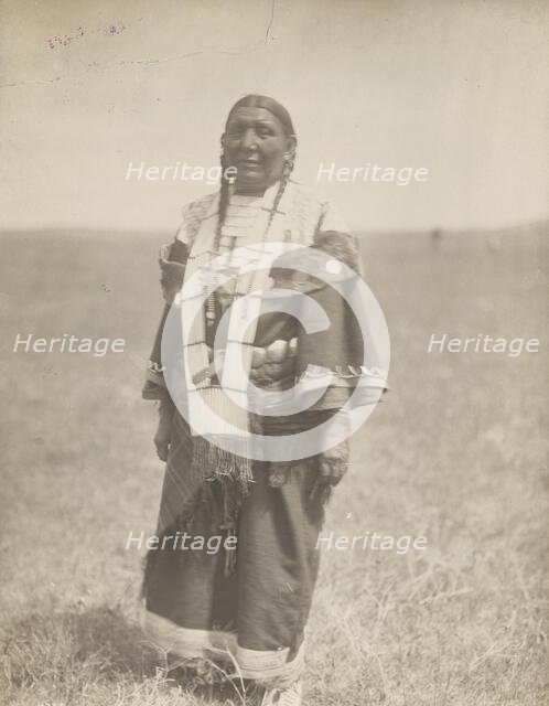 Spotted Eagle's wife, 1907. Creator: Edward Sheriff Curtis.