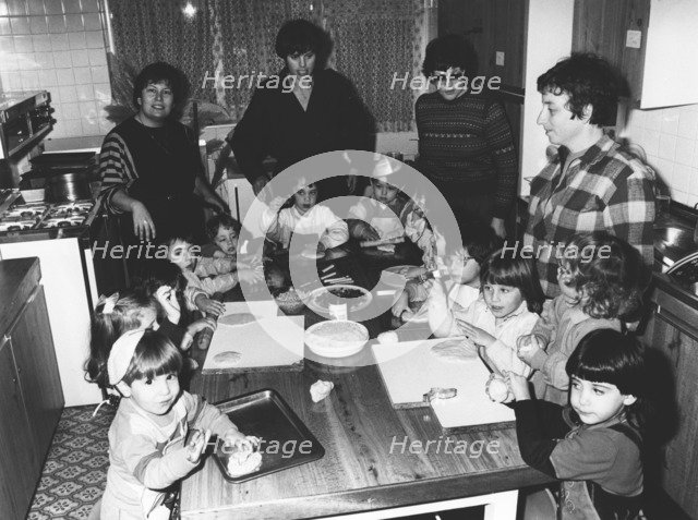 Teacher Janet Lawson demonstrates kichal baking, Gan Yeladim Synagogue kitchen, Reading, 1987. Artist: Unknown