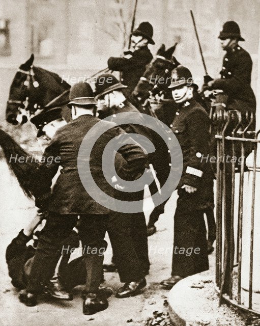 Police arresting a group of hunger marchers in London, 1932. Artist: Unknown