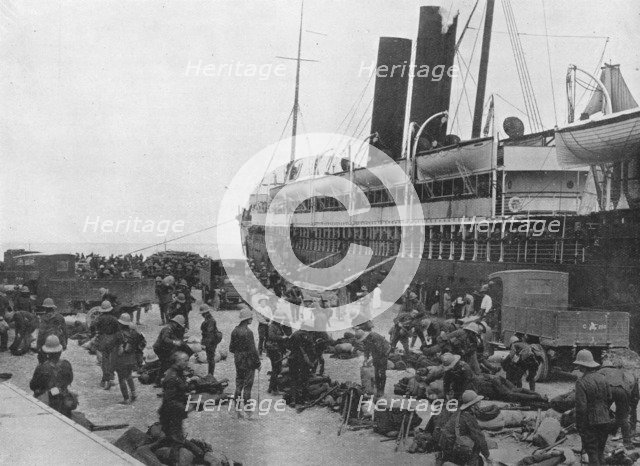 'The Dardanelles Expeditionary Force sets out: A transport loading up at Alexandria', 1915. Artist: Unknown.