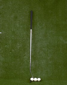 Modern-style golf club and three balls, late 20th century. Artist: Unknown