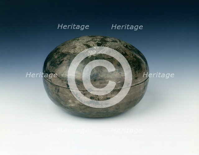 Round silver box with two incised phoenixes, Yuan dynasty, China, 1279-1368. Artist: Unknown