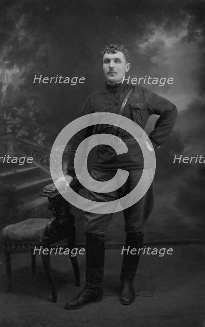 Kruchin Vitaly Mikhailovich in the editorial office of the newspaper "Forward"..., 1920s. Creator: Unknown.