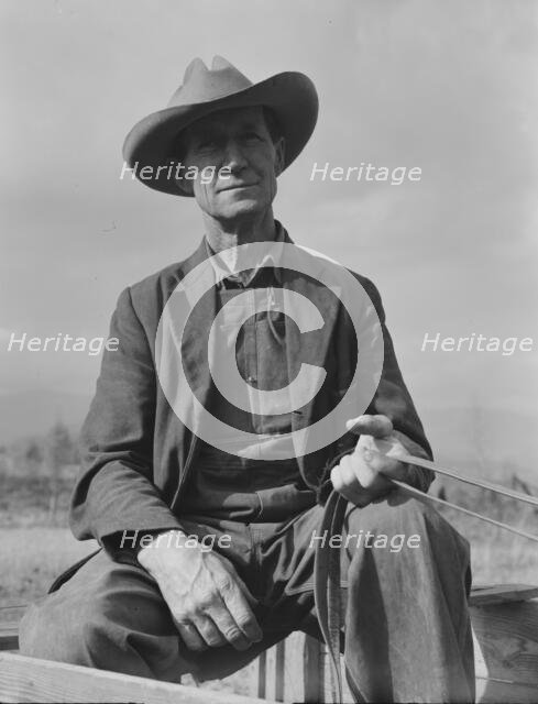 Ex-Nebraska farmer now a stump farmer, FSA Borrower, Bonner County, Idaho, 1939. Creator: Dorothea Lange.